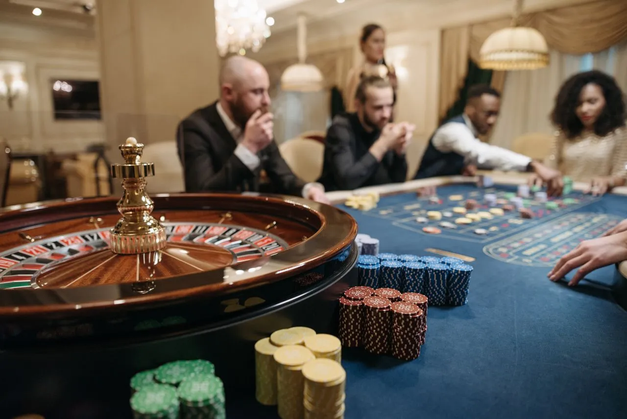 Poker-themed entertainment photograph for the Friday event